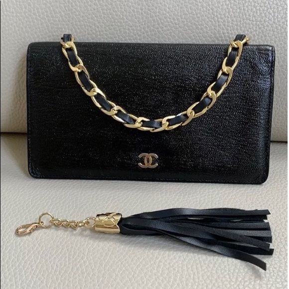 CHANEL Handbags - Chanel authentic WOC black gold crossbody